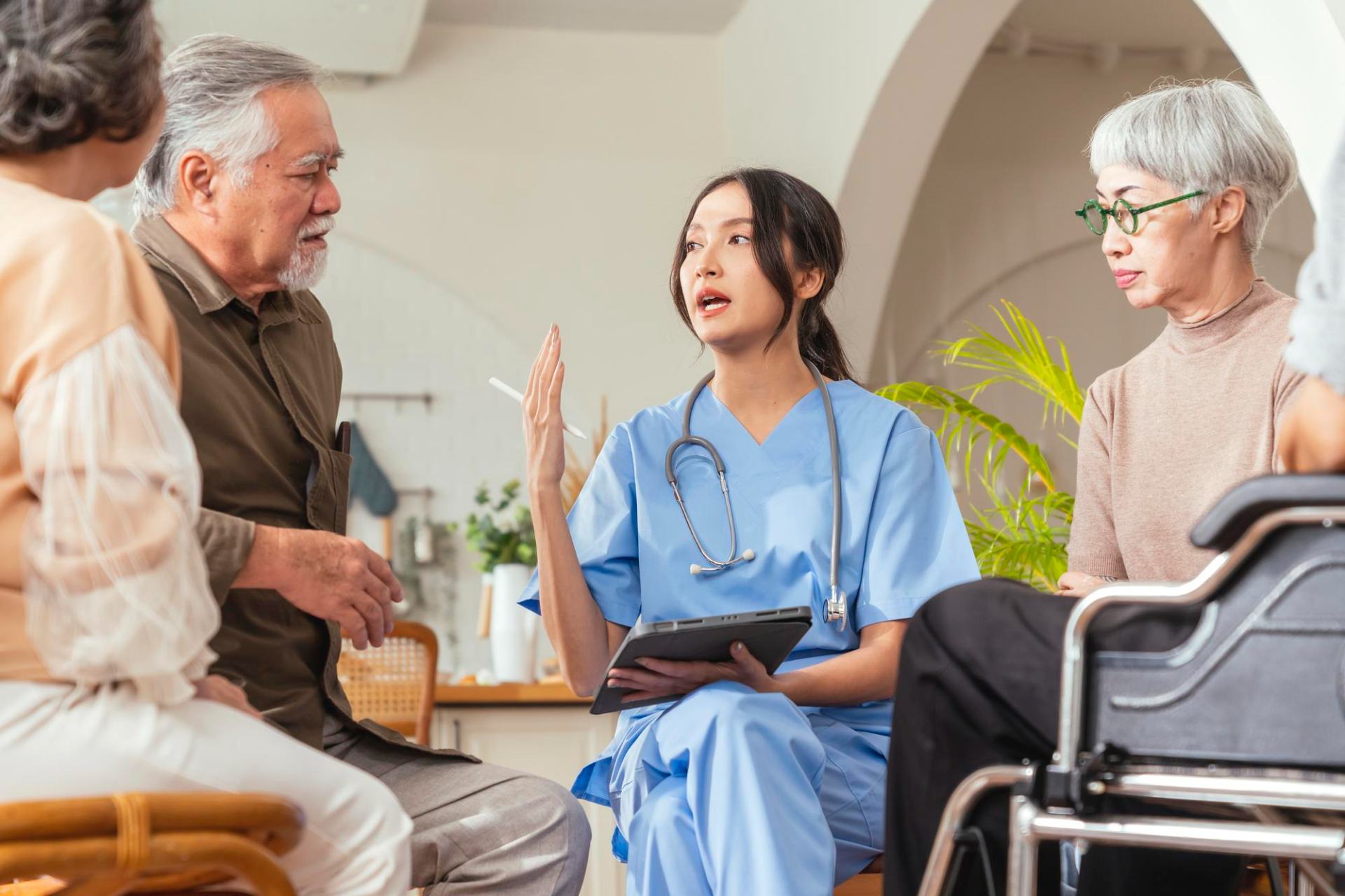 Homecare staff in a meeting discussing a care plan Homecare staff in a meeting discussing a care plan