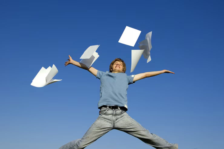 A man leaping in the air while throwing away his paperwork. Domiciliary care software can help eliminate paperwork. A man leaping in the air while throwing away his paperwork. Domiciliary care software can help eliminate paperwork.
